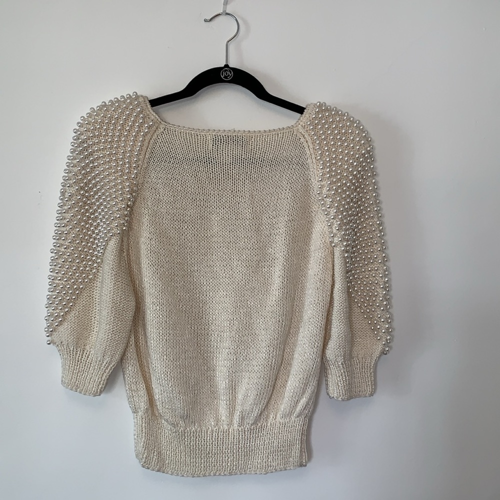 Nannell brand  medium Pearl white sweater with pearls along the sleeves